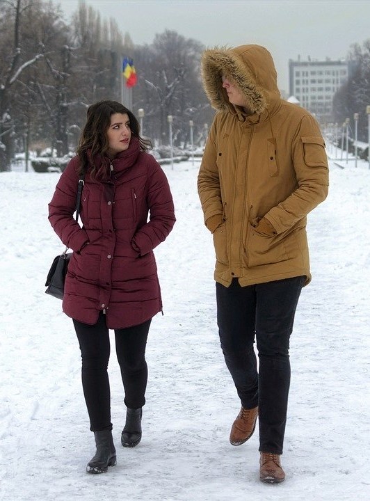 An engaged couple having a deep conversation about their future