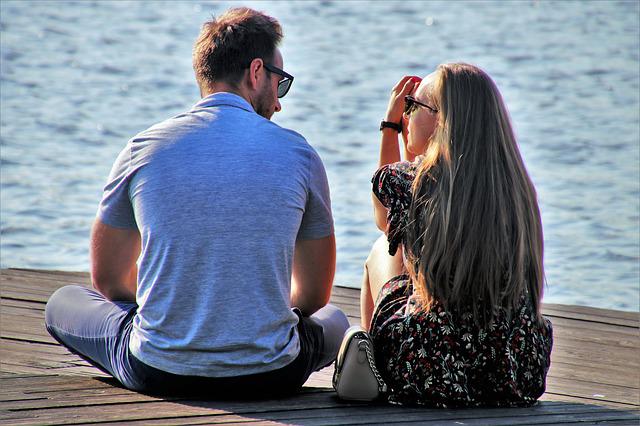 A couple engaged in an attentive conversation, practicing active listening